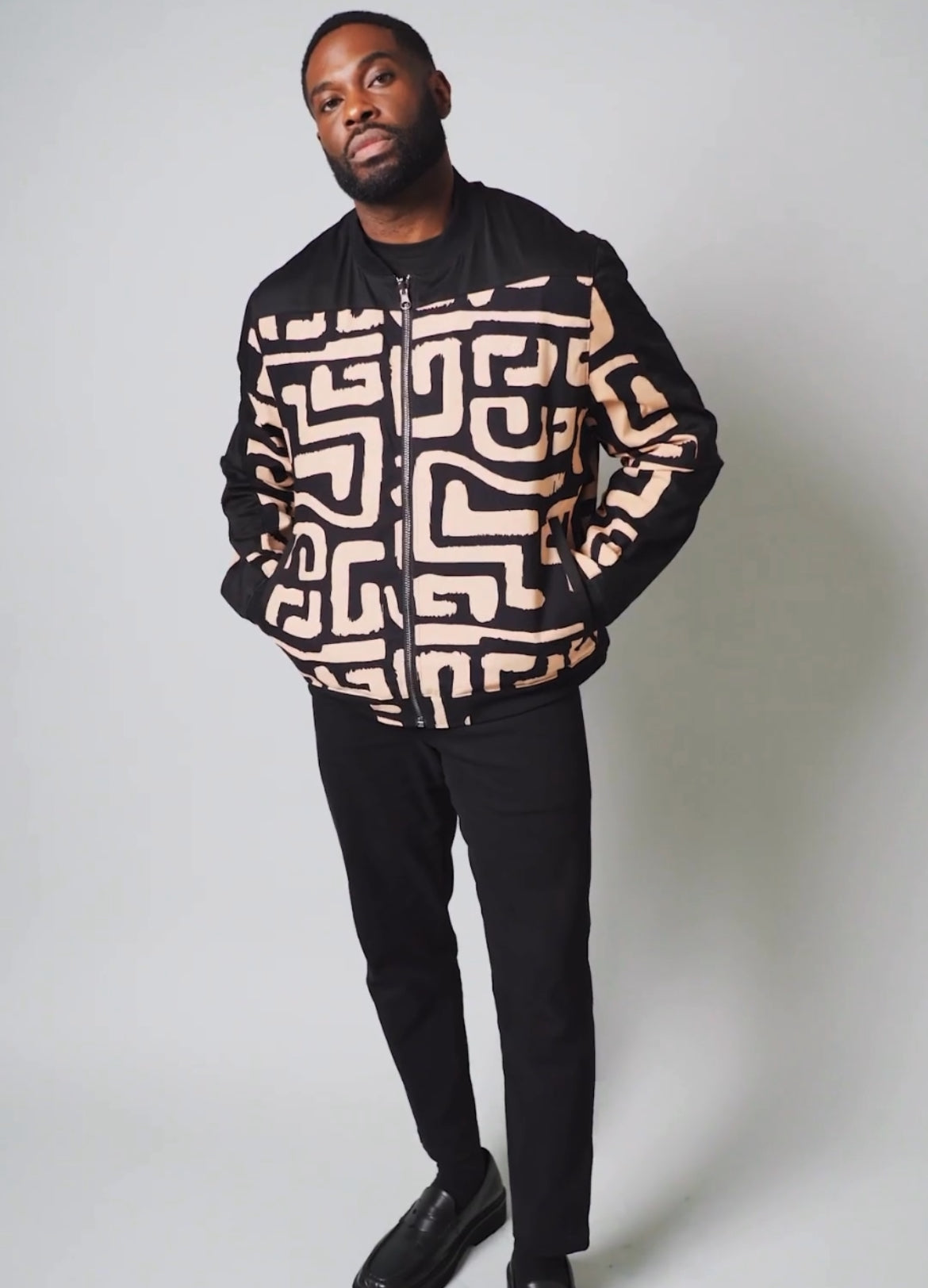 Bomber outlets jacket with African print contrast fabric